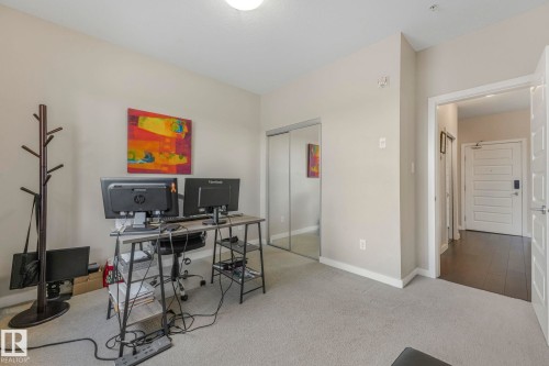 Carpeted office featuring baseboards - 122 304 Ambleside Link Link, Edmonton, AB - Indoor Photo Showing Office