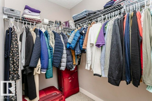 View of walk in closet - 1381 Rutherford Road, Edmonton, AB - Indoor With Storage