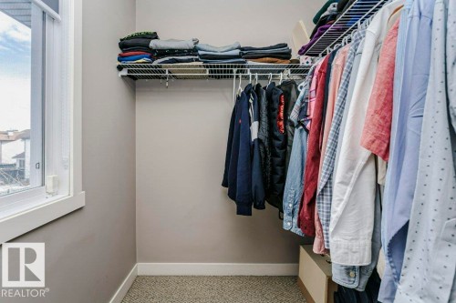 View of walk in closet - 1381 Rutherford Road, Edmonton, AB - Indoor With Storage