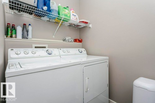 Laundry room featuring washer and clothes dryer - 1381 Rutherford Road, Edmonton, AB - Indoor Photo Showing Laundry Room