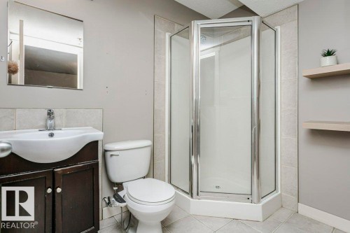 Full bath with vanity, a shower stall, and tile patterned flooring - 1381 Rutherford Road, Edmonton, AB - Indoor Photo Showing Bathroom