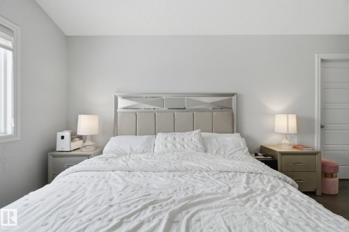 Bedroom with multiple windows - 9942 222A St Nw, Edmonton, AB - Indoor Photo Showing Bedroom