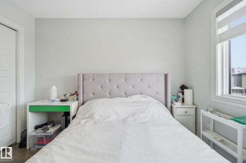 Bedroom with wood finished floors - 9942 222A St Nw, Edmonton, AB - Indoor Photo Showing Bedroom