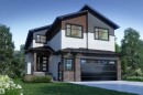 Modern home featuring brick siding, an attached garage, stucco siding, concrete driveway, and a front lawn - 463 Crystal Creek Link, Leduc, AB  - Outdoor With Facade 