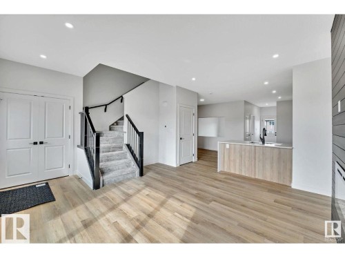 Foyer featuring recessed lighting and light wood-type flooring - 426 Crystal Creek Link, Leduc, AB - Indoor