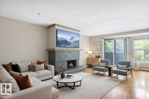 11122 83 Avenue, Edmonton, AB - Indoor Photo Showing Living Room With Fireplace