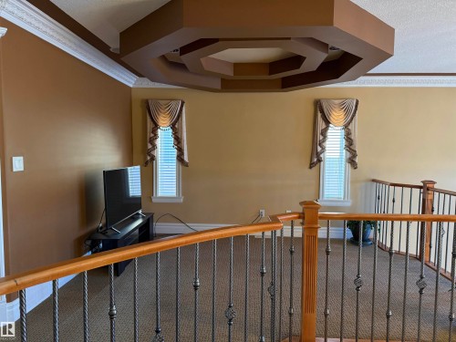 Interior space with carpet flooring - 816 Wildwood Crescent Nw, Edmonton, AB - Indoor Photo Showing Other Room