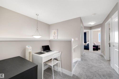 Office area featuring light colored carpet and baseboards - 81 Richmond Link, Fort Saskatchewan, AB - Indoor