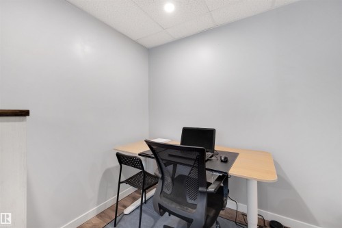 Office featuring a paneled ceiling and wood finished floors - 81 Richmond Link, Fort Saskatchewan, AB - Indoor Photo Showing Office
