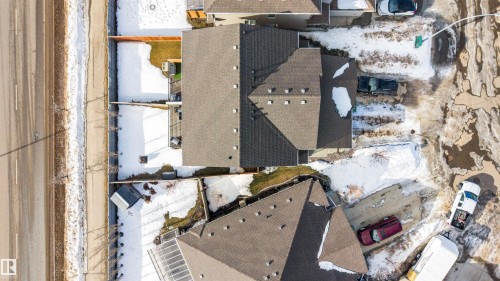 Snowy aerial view featuring a residential view - 81 Richmond Link, Fort Saskatchewan, AB - Outdoor