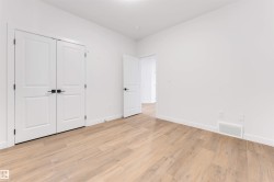 Unfurnished bedroom with light wood-type flooring and a closet - 
