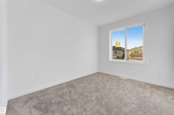 Carpeted empty room with baseboards - 