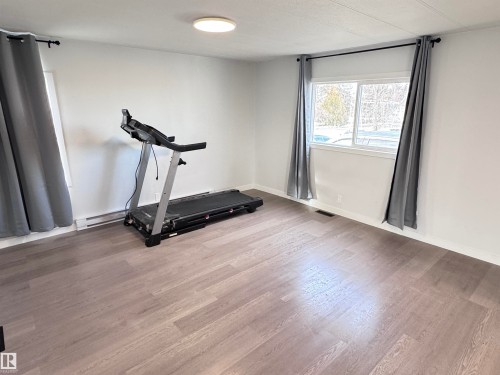 68 9501 104 Avenue, Westlock, AB - Indoor Photo Showing Gym Room