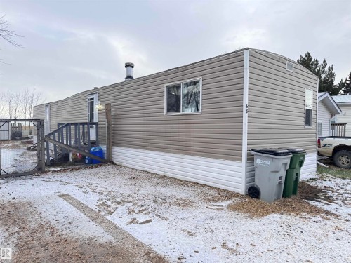 Snow covered property - 68 9501 104 Avenue, Westlock, AB - Outdoor With Exterior