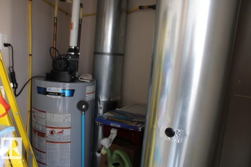 Utilities featuring water heater - 330 4831 104A Street, Edmonton, AB - Indoor Photo Showing Basement