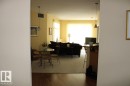 Dining room featuring newer laminate floors - 330 4831 104A Street, Edmonton, AB  - Indoor 