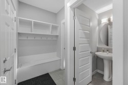 Bathroom featuring light tile patterned flooring - 