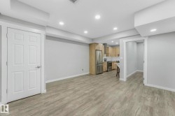 Unfurnished living room featuring recessed lighting and light wood-style floors - 