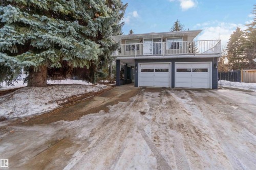 View of front of property featuring driveway and a garage - 6 Garraway Pl, St. Albert, AB - Outdoor