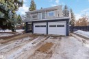 Snow covered garage with concrete driveway - 6 Garraway Pl, St. Albert, AB  - Outdoor 