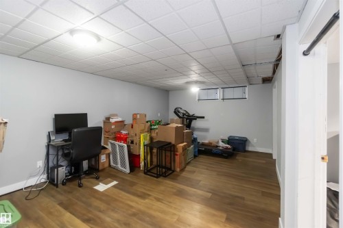 Home office featuring wood finished floors and a paneled ceiling - 6 Garraway Pl, St. Albert, AB - Indoor