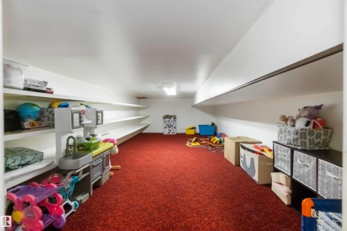Playroom with dark colored carpet - 6 Garraway Pl, St. Albert, AB - Indoor Photo Showing Other Room