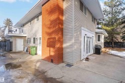 View of side of property with crawl space and a balcony - 