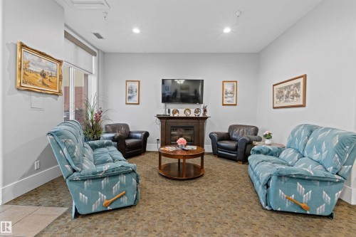 115 6608 28 Avenue, Edmonton, AB - Indoor Photo Showing Living Room
