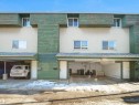View of front of house featuring stucco siding and a carport - 791 Abbottsfield Road, Edmonton, AB  - Outdoor 