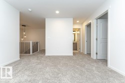 Empty room featuring light carpet and recessed lighting - 