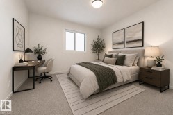 This bright room features a window, light-colored carpet, and an overhead light fixture - 