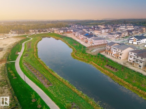 Aerial overview of property's location featuring a large body of water - 3972 Wren Loop, Edmonton, AB - Outdoor With Body Of Water With View