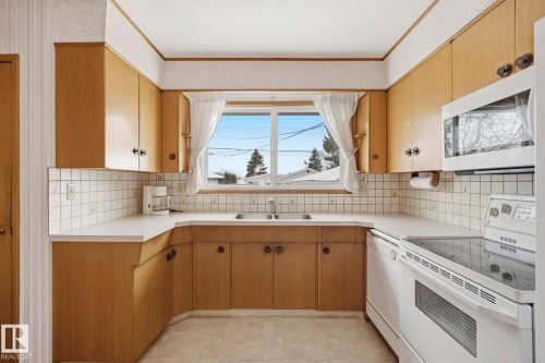 5304 114B Street, Edmonton, AB - Indoor Photo Showing Kitchen With Double Sink