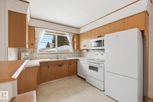 5304 114B Street, Edmonton, AB - Indoor Photo Showing Kitchen With Double Sink