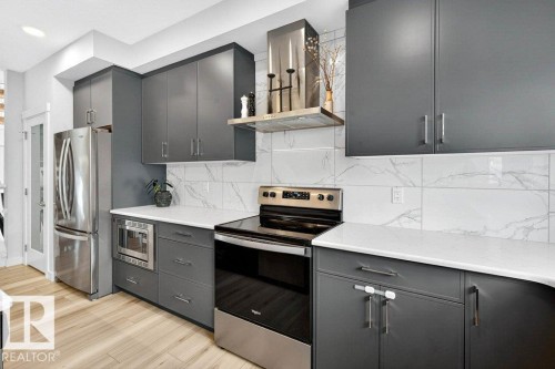 7 9745 92 Street, Edmonton, AB - Indoor Photo Showing Kitchen With Upgraded Kitchen