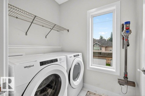 7 9745 92 Street, Edmonton, AB - Indoor Photo Showing Laundry Room