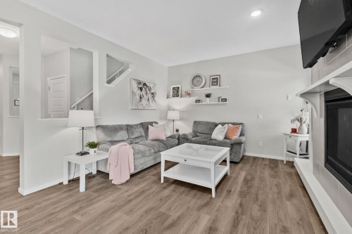 2357 Cassidy Way, Edmonton, AB - Indoor Photo Showing Living Room With Fireplace