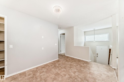 Spare room featuring baseboards - 5308 20 Avenue, Edmonton, AB - Indoor Photo Showing Other Room