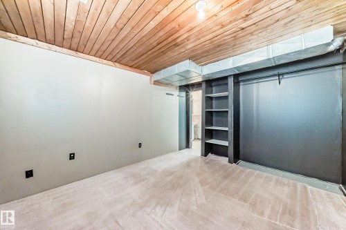 Unfurnished bedroom with wood ceiling - 5308 20 Avenue, Edmonton, AB - Indoor