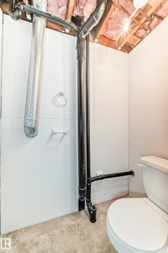 Bathroom with toilet - 5308 20 Avenue, Edmonton, AB - Indoor
