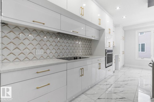 5804 Soleil Boulevard, Beaumont, AB - Indoor Photo Showing Kitchen With Upgraded Kitchen