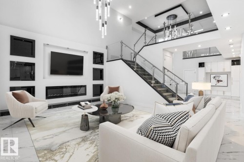 5804 Soleil Boulevard, Beaumont, AB - Indoor Photo Showing Other Room With Fireplace