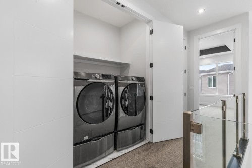 5804 Soleil Boulevard, Beaumont, AB - Indoor Photo Showing Laundry Room