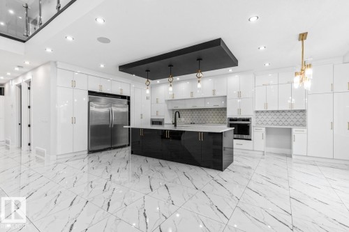 5804 Soleil Boulevard, Beaumont, AB - Indoor Photo Showing Kitchen With Upgraded Kitchen