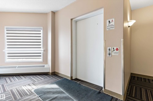 211 16715 100 Avenue, Edmonton, AB - Indoor Photo Showing Other Room