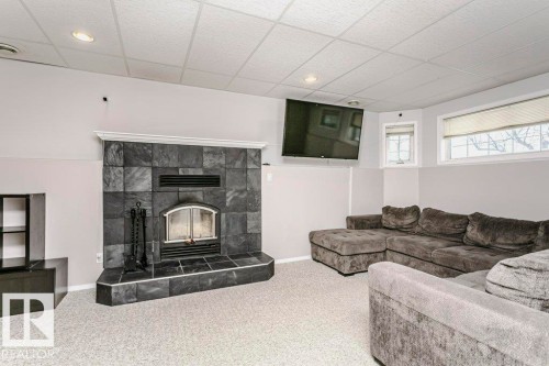 4408 Miller Drive, Onoway, AB - Indoor Photo Showing Living Room With Fireplace