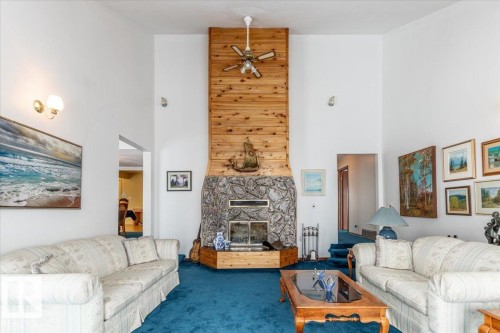 125 Pine Drive, Wetaskiwin, AB - Indoor Photo Showing Living Room With Fireplace