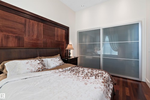 Bedroom with dark wood-style flooring - 169 Callaghan Drive, Edmonton, AB - Indoor Photo Showing Bedroom