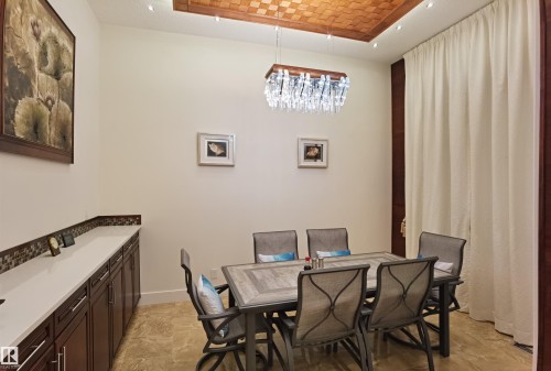 Dining space featuring a tray ceiling and baseboards - 169 Callaghan Drive, Edmonton, AB - Indoor Photo Showing Dining Room