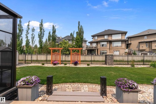 View of yard with a residential view, a pergola, and a patio area - 169 Callaghan Drive, Edmonton, AB - Outdoor With Deck Patio Veranda